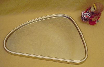 kleiner Wandspiegel in Nierentisch-Form